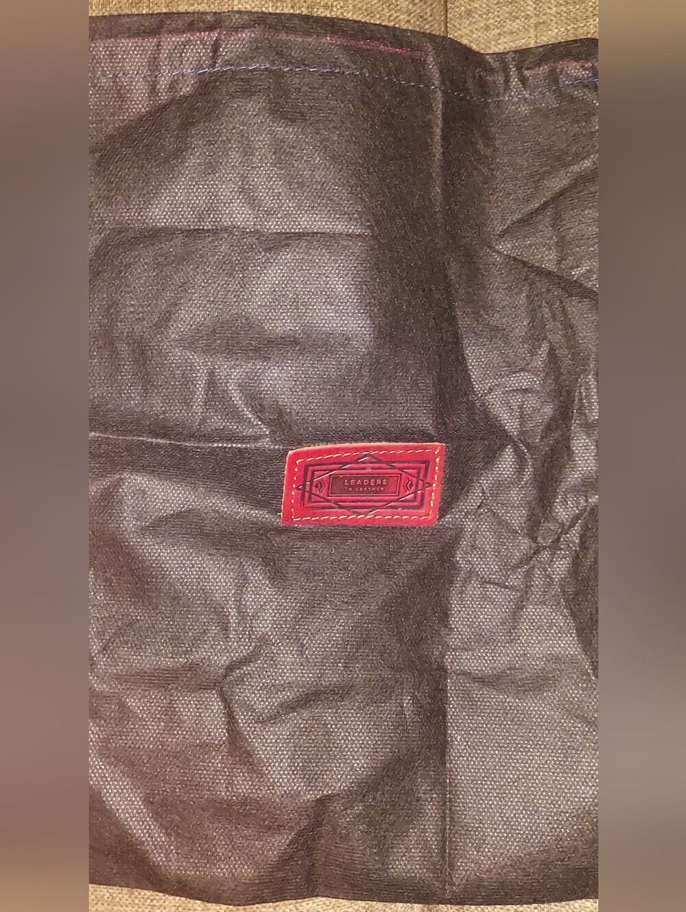 Black Dust Bag with Red Logo by Leaders In Leather